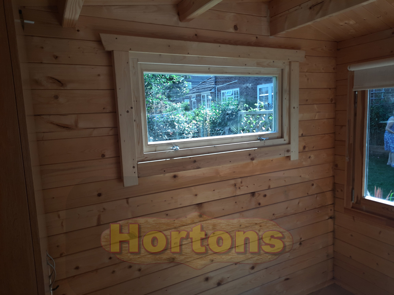 New window added to a log cabin